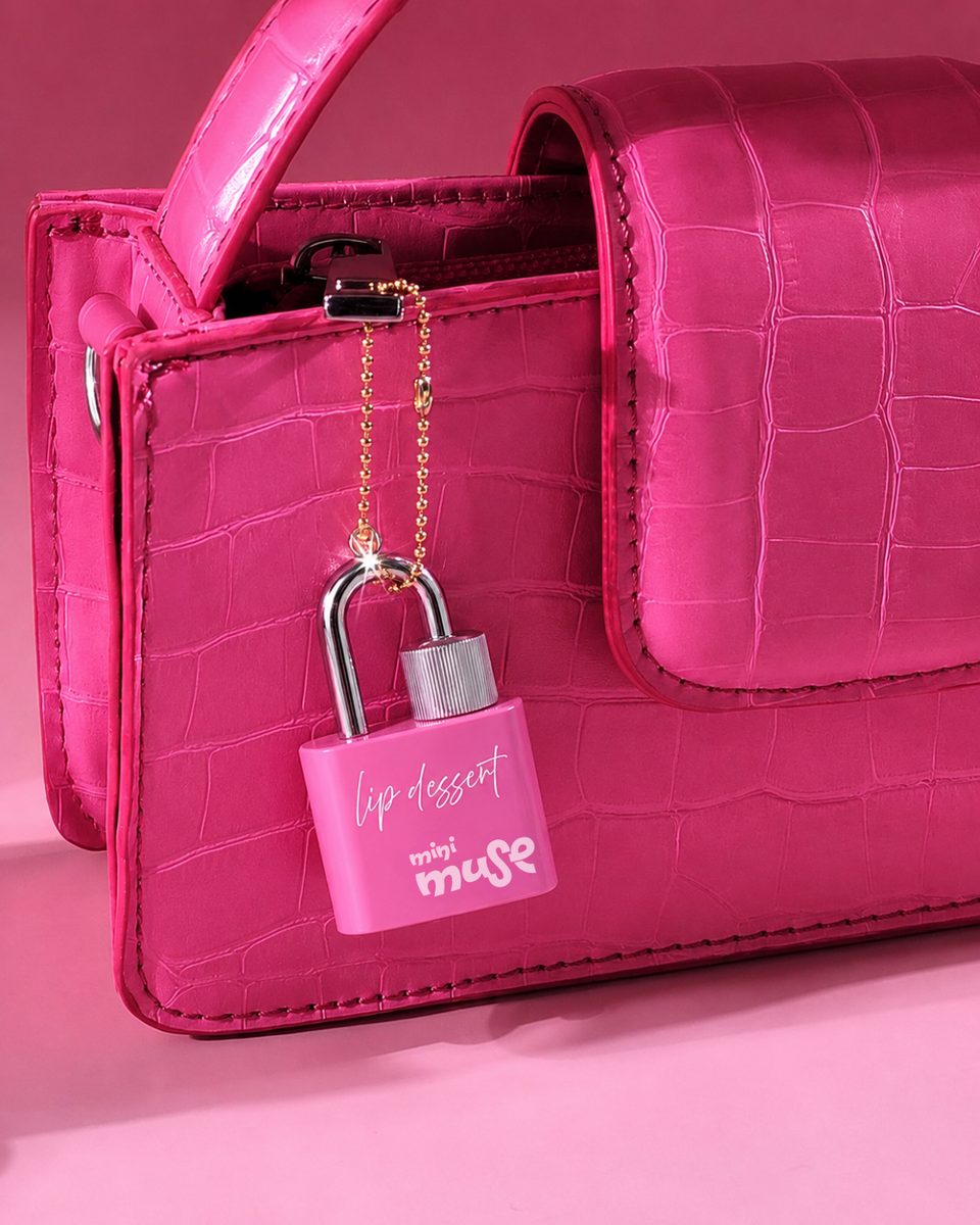Mini Muse Lip Dessert clipped to a handbag